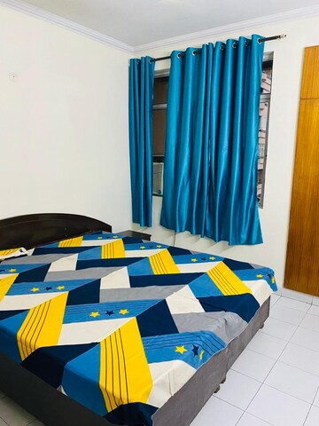 Bedroom in 4 BHK Builder Floor at Ansal Sushant Estate, Sector 52 – for Rent