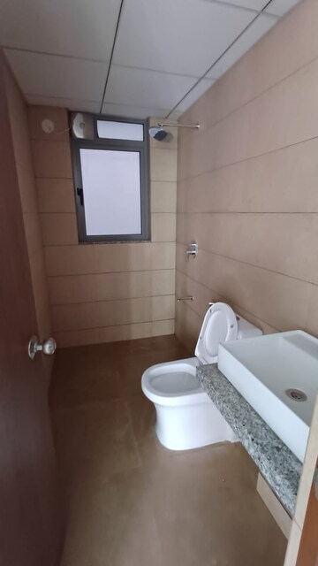 Bathroom in 2 BHK Apartment at Kalpataru Immensa, Kolshet Road – for Rent