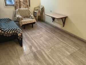 Living Room in 2 BHK Apartment at Raheja Garden Estate Kokanipada, Kokanipada – for Sale