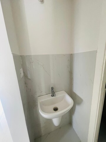 Bathroom in 1 BHK Apartment at Runwal Gardens, Dombivli East – for Rent