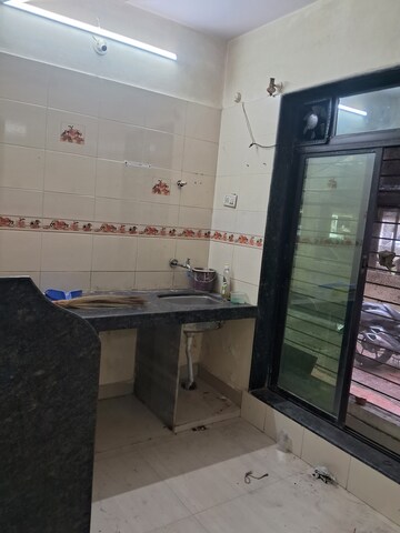 Kitchen in 1 BHK Apartment at Crystal Residency Kopar , Kopar Khairane – for Rent