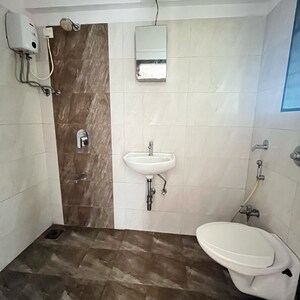 Bathroom in 2 BHK Apartment at Kaustubh Sun Moon CHS Ltd Bldg 12, Datta Pada – for Sale