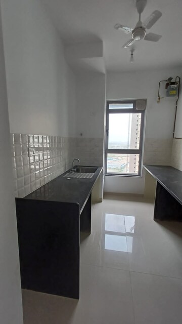Kitchen in 2 BHK Apartment at Kalpataru Immensa, Kolshet Road – for Rent