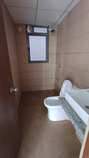 Bathroom in 2 BHK Apartment at Kalpataru Immensa, Kolshet Road – for Rent