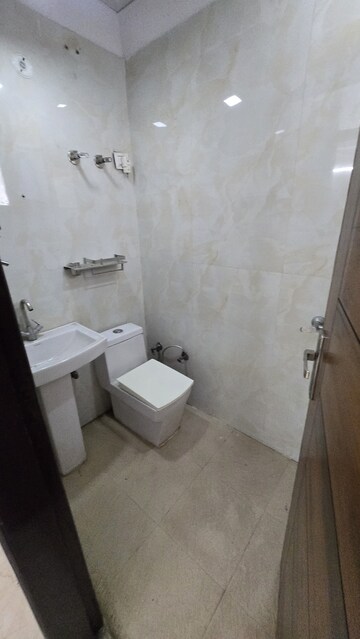 Bathroom in 4 BHK Builder Floor at Gyan Khand ii – for Sale