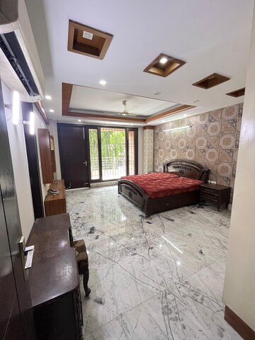 Bedroom in 4 BHK Builder Floor at Kalkaji – for Rent