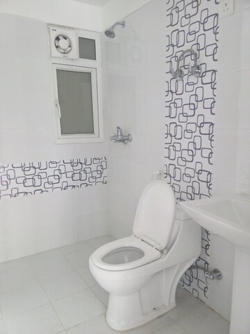 Bathroom in 4 BHK Apartment at Irish Pearls, Tech Zone 4 Greater Noida – for Sale