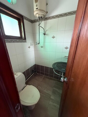 Bathroom in 3 BHK Builder Floor at Gulmohar Park – for Rent