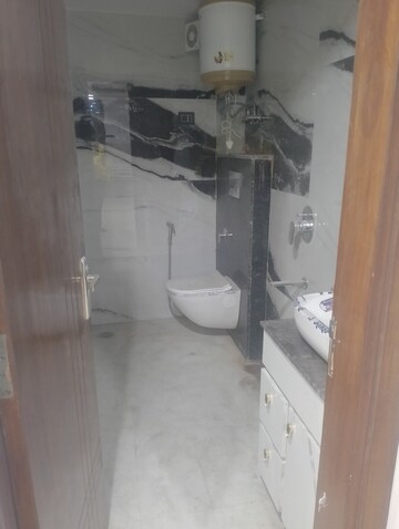 Bathroom in 3 BHK Apartment at Vishwakarma Colony – for Rent