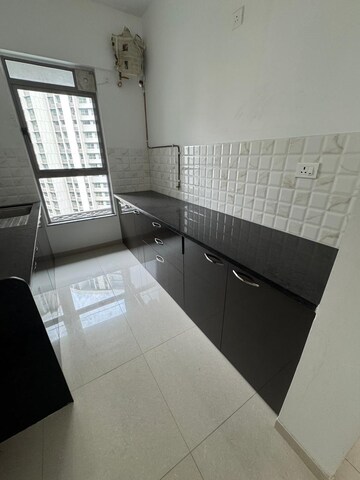 Kitchen in 2 BHK Apartment at Kalpataru Immensa, Kolshet Road – for Rent