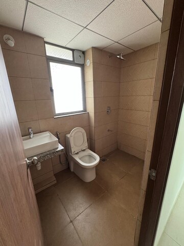 Bathroom in 2 BHK Apartment at Kalpataru Immensa, Kolshet Road – for Rent