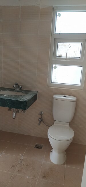 Bathroom in 4 BHK Builder Floor at BPTP Parkland Pride, Sector 77 – for Sale