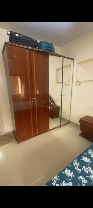 Living Room in 2 BHK Apartment at K Raheja Palm Court, Malad West – for Rent