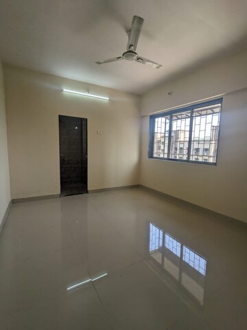Room in 2 BHK Apartment at Ekta Tripolis, Goregaon West – for Rent