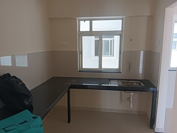 Kitchen in 2 BHK Apartment at Megapolis Serenity, Hinjewadi – for Rent