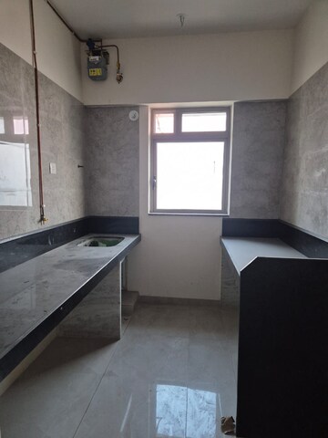 Kitchen in 3 BHK Apartment at Oberoi Realty Esquire, Goregaon East – for Rent