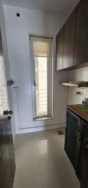 Kitchen in 3 BHK Apartment at Sheth Vasant Lawns, Laxmi Nagar – for Rent