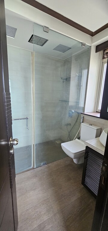 Bathroom in 3 BHK Apartment at Sheth Vasant Lawns, Laxmi Nagar – for Rent