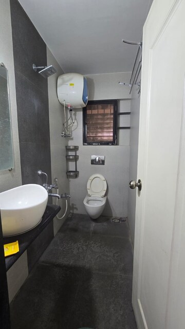 Bathroom in 3 BHK Apartment at Happy Valley, Manpada – for Rent