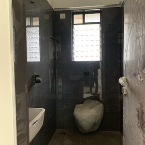 Bathroom in 2 BHK Apartment at Goyal Abhiram, Kastur Park – for Sale