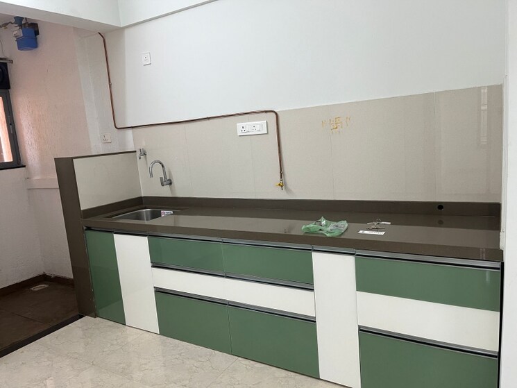 Kitchen, rama-celestial-city-phase-ii 2 Bedroom 950 Sq.Ft. Apartment In Ravet Pune 8692357