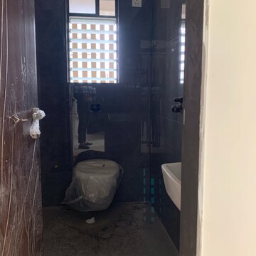 Bathroom in 2 BHK Apartment at Goyal Abhiram, Kastur Park – for Sale