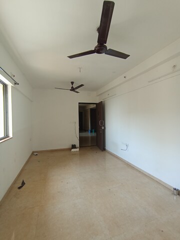 Living Room in 1 BHK Apartment at Lodha Palava Downtown, Dombivli East – for Rent