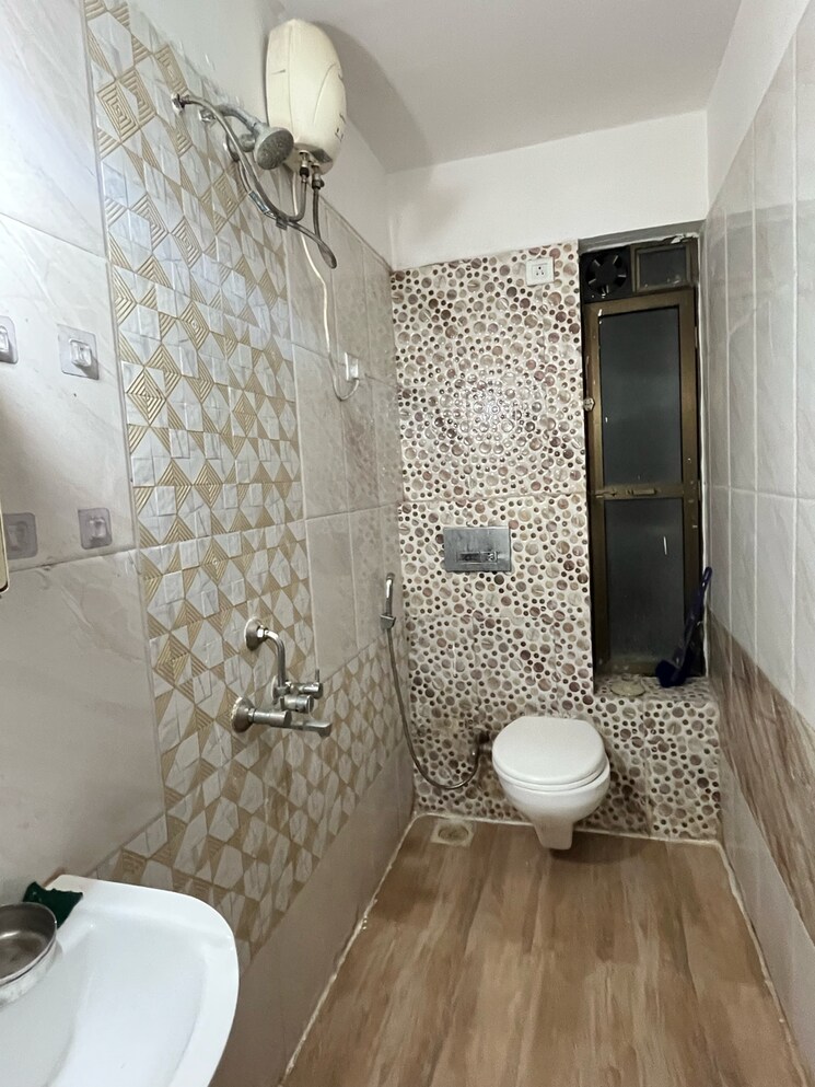 Bathroom, man-opus 2 Bedroom 670 Sq.Ft. Apartment In Miragaon Thane 8692757