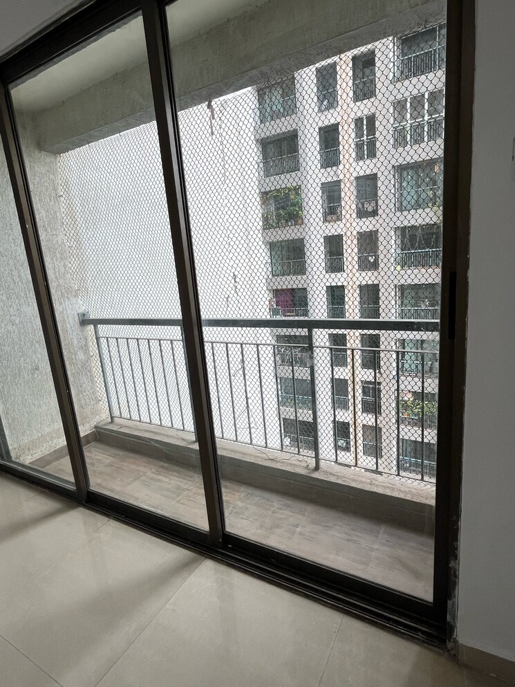 Balcony, man-opus 2 Bedroom 670 Sq.Ft. Apartment In Miragaon Thane 8692757