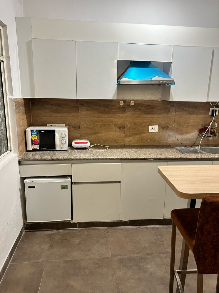 Kitchen, nimbus-the-golden-palm 1 Bedroom 506 Sq.Ft. Apartment In Sector 168 Noida 8693031