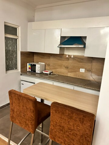 Kitchen in 1 BHK Apartment at Nimbus The Golden Palm, Sector 168 – for Rent