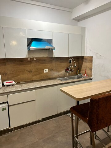Kitchen in 1 BHK Apartment at Nimbus The Golden Palm, Sector 168 – for Rent