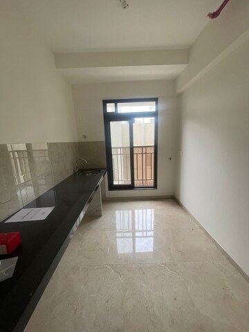 Kitchen in 1 BHK Apartment at MICL Aaradhya Highpark, Mira Road – for Sale