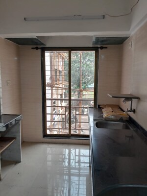 Living Room in 1 BHK Apartment at Kandivali West – for Sale