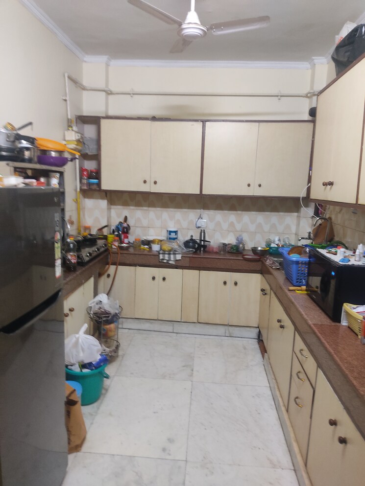 Kitchen, shivalik colony 3 Bedroom 200 Sq.Yd. Builder Floor In Shivalik Colony Delhi 8693571