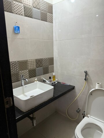 Bathroom in 3 BHK Apartment at Strawberry Sandstone, Mira Road – for Rent