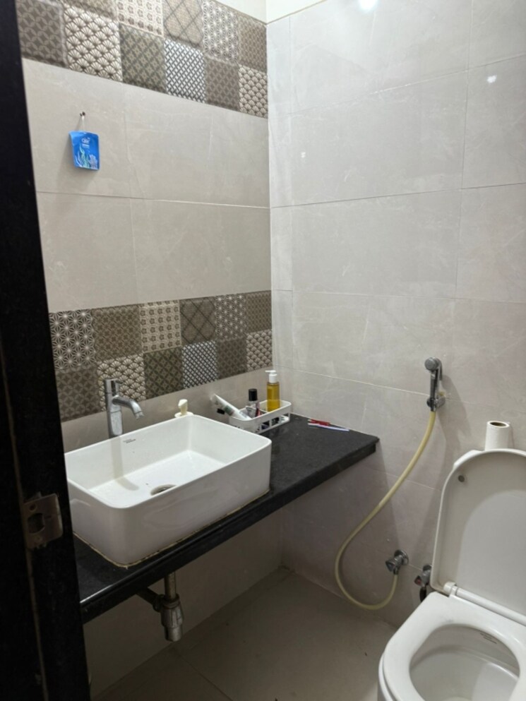 Bathroom, strawberry-sandstone 3 Bedroom 1240 Sq.Ft. Apartment In Mira Road Thane 8693883