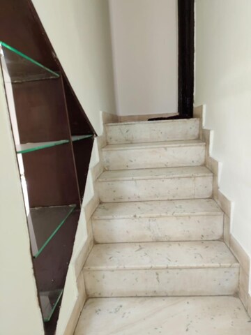 Staircase in 3 BHK Apartment at Ansal Harmony Homes, Sector 57 – for Rent