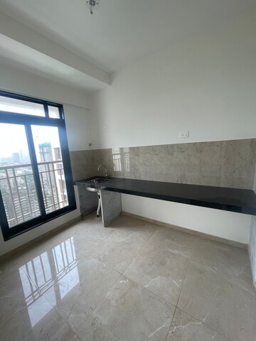Kitchen in 2 BHK Apartment at MICL Aaradhya Highpark, Mira Road – for Sale