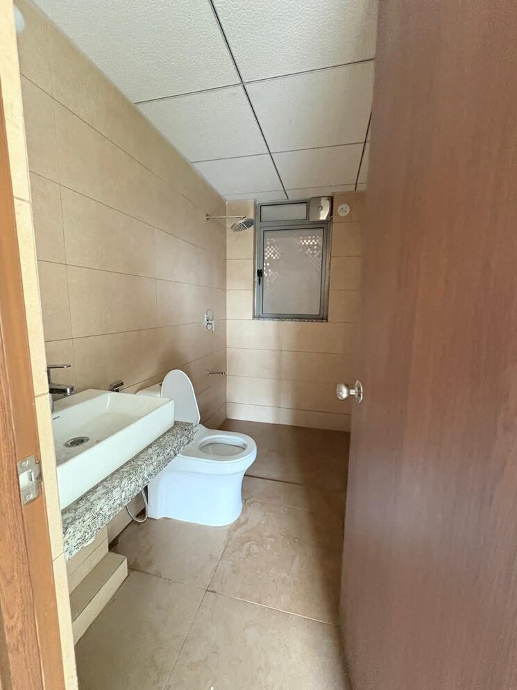 Bathroom, kalpataru-immensa-b 2 Bedroom 598 Sq.Ft. Apartment In Kolshet Road Thane 8694130