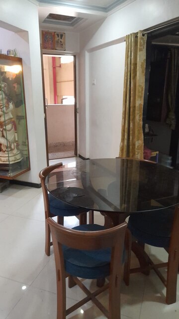 Living Room in 2 BHK Apartment at Kalpa Taru Siddhachal III, Vasant Vihar – for Rent