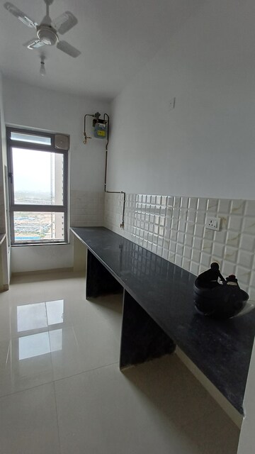 Kitchen in 3 BHK Apartment at Kalpataru Immensa, Kolshet Road – for Rent
