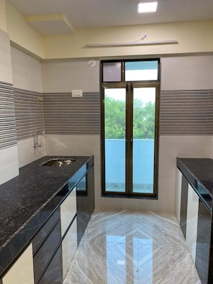 Kitchen in 1 BHK Apartment at Parvati Palace Shivaji Nagar, Dombivli West – for Sale