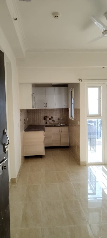 Kitchen in 1 BHK Apartment at Gaur City 2 - 14th Avenue, Sector 16c Greater Noida – for Rent