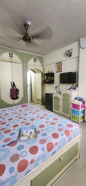 Master Bedroom in 2 BHK Apartment at Dashmesh Colony, Andheri West – for Sale