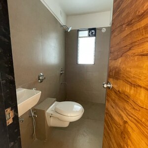 Attached Bathroom in 1 BHK Apartment at Je And Vee Om Trimurti, Dindoshi – for Sale