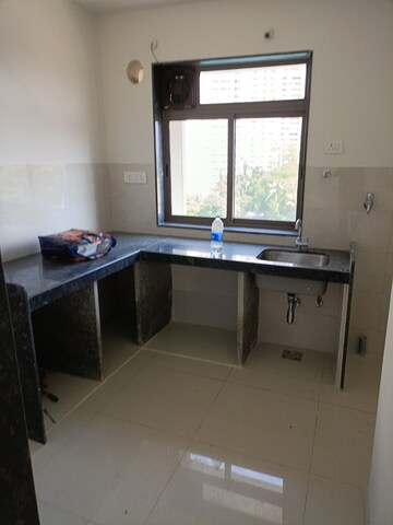 Kitchen in 2 BHK Apartment at Runwal Eirene, Balkum Pada – for Rent