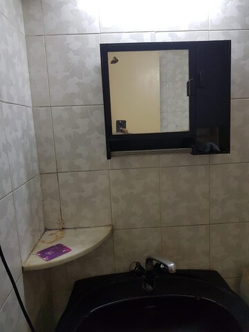 Bathroom in 1.5 BHK Apartment at Gururaj Society – for Rent