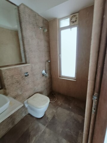 Bathroom in 2 BHK Apartment at Omkar Alta Monte, Malad East – for Rent