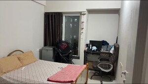 Living Room in 2 BHK Apartment at Rustomjee Urbania Azziano, Majiwada – for Sale